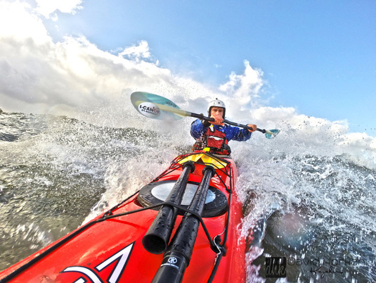 David Horkan kayaking with Werner Shuna paddles
